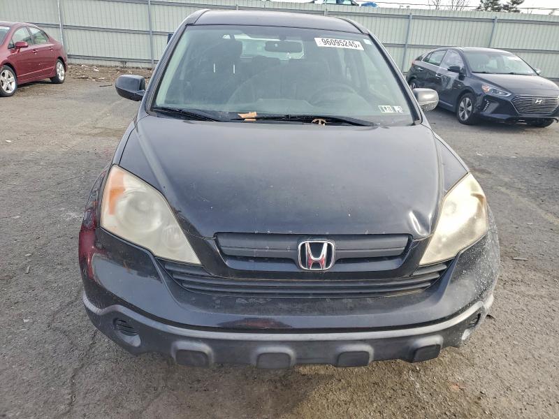 Photo 5 from auction – 2007 HONDA CR-V LX with VIN JHLRE48367C028668