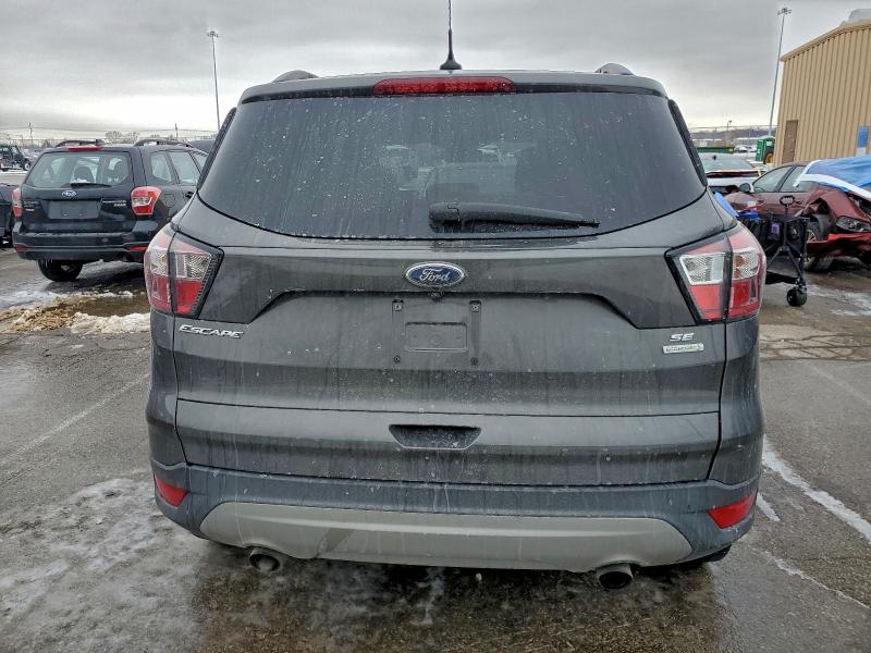 Photo 6 from auction – 2018 FORD ESCAPE SE with VIN 1FMCU0GD7JUB81548