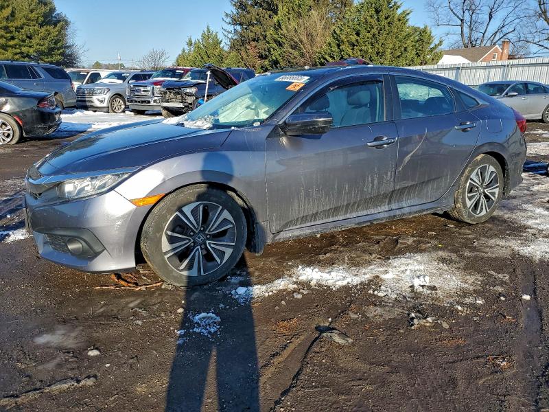 HONDA CIVIC EX 2016 with VIN 2HGFC1F34GH639739 - Photo from auction