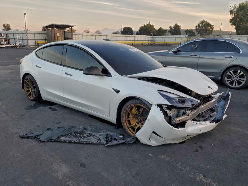 Photo 4 from auction – 2022 TESLA MODEL 3 with VIN 5YJ3E1EA7NF167664