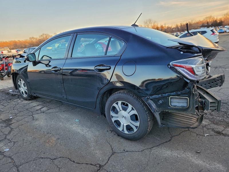 Photo 2 from auction – 2013 HONDA CIVIC HYBR with VIN 19XFB4F29DE201851