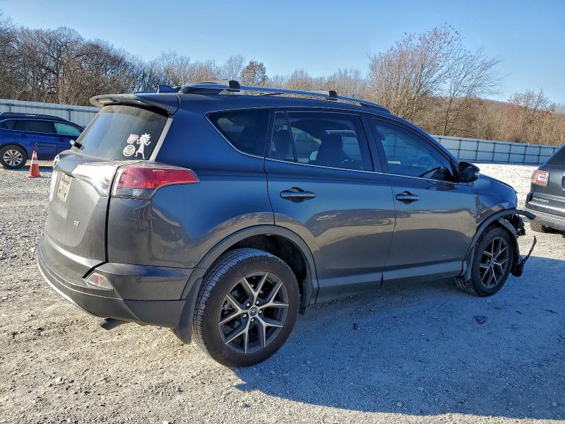 Photo 3 from auction – 2017 TOYOTA RAV4 SE with VIN JTMNFREV7HJ716929