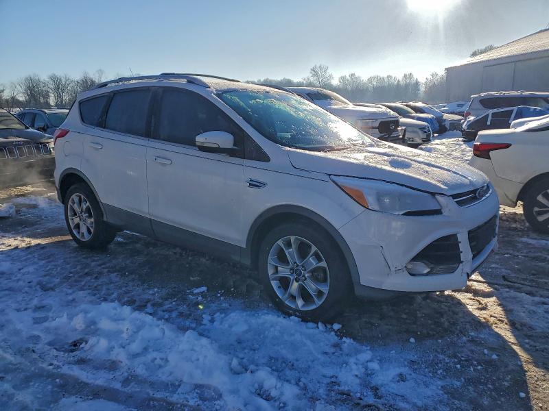 Photo 4 from auction – 2014 FORD ESCAPE with VIN 1FMCU9J92EUE45094