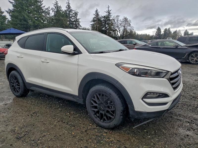 Photo 4 from auction – 2016 HYUNDAI TUCSON LIM with VIN KM8J33A41GU030783