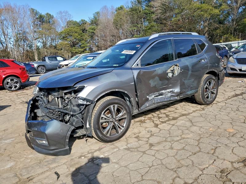 NISSAN ROGUE S 2017 with VIN JN8AT2MV9HW025229 - Photo from auction