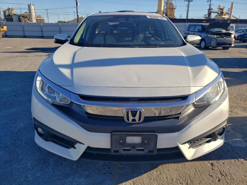Photo 5 from auction – 2018 HONDA CIVIC EX with VIN JHMFC1F32JX039012