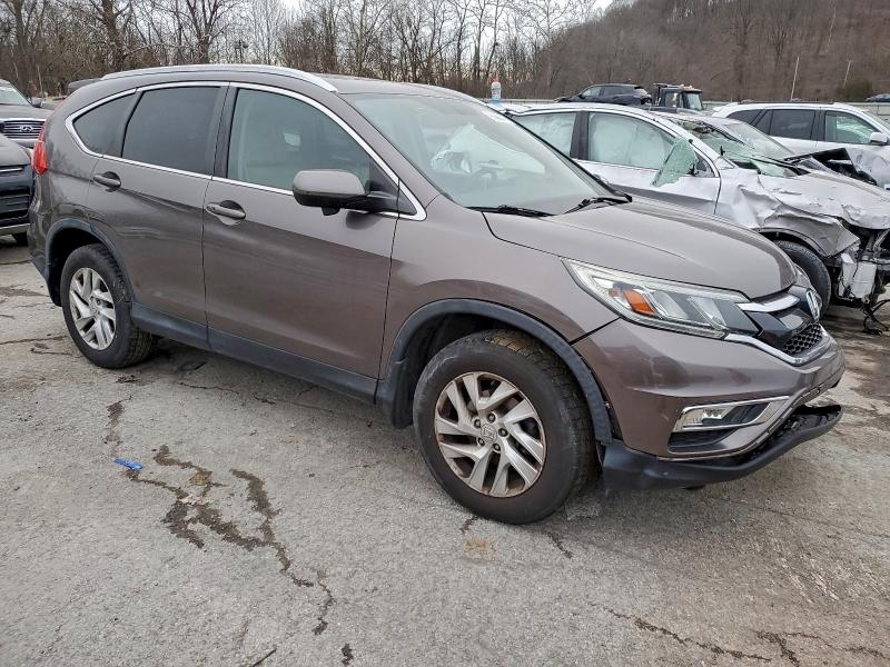 Photo 4 from auction – 2016 HONDA CR-V EXL with VIN 2HKRM4H79GH630178