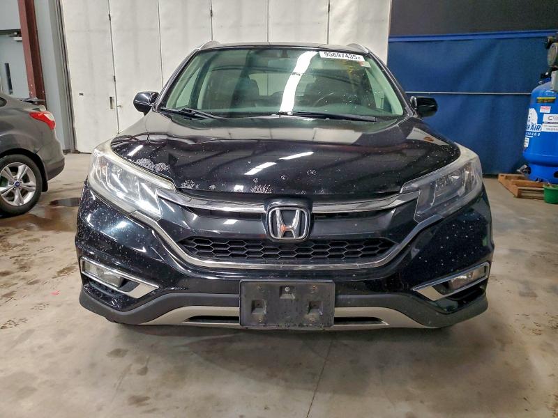 Photo 5 from auction – 2015 HONDA CR-V EXL with VIN 2HKRM4H79FH624556