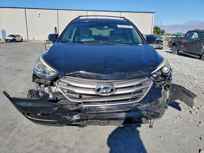 Photo 5 from auction – 2017 HYUNDAI SANTA FE S with VIN 5NMZU3LB9HH008958