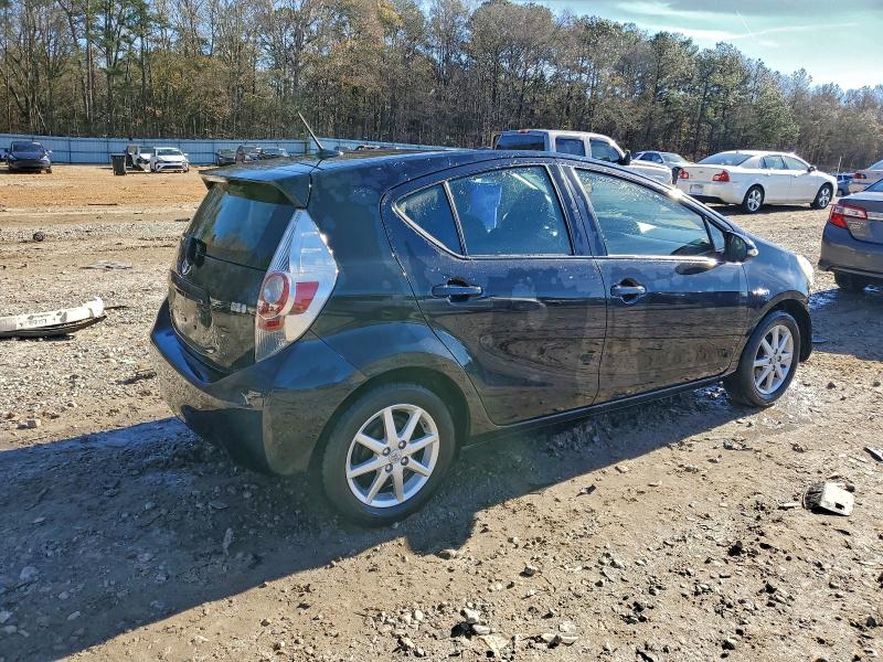 Photo 3 from auction – 2014 TOYOTA PRIUS C with VIN JTDKDTB3XE1077255