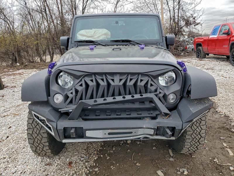 Photo 5 from auction – 2016 JEEP WRANGLER U with VIN 1C4BJWDG9GL235585
