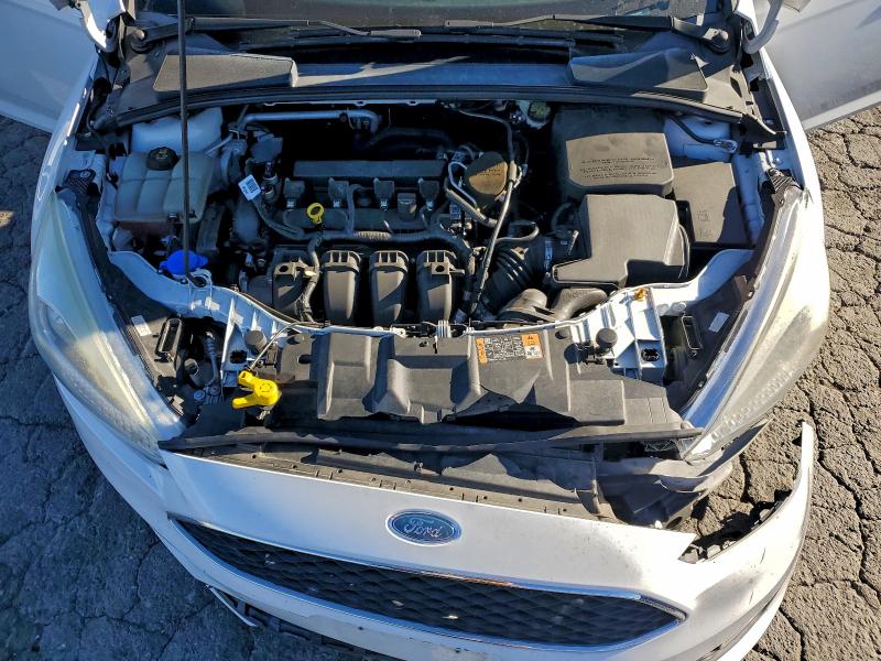 Photo 11 from auction – 2016 FORD FOCUS SE with VIN 1FADP3F24GL238505