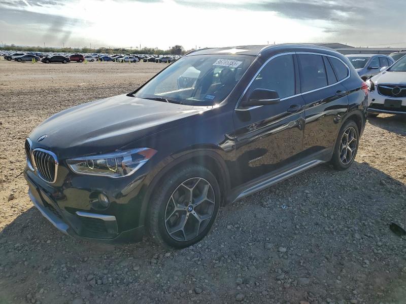 BMW X1 XDRIVE2 2016 with VIN WBXHT3C30GP881823 - Photo from auction
