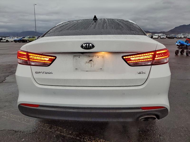 Photo 6 from auction – 2016 KIA OPTIMA EX with VIN 5XXGU4L34GG014153