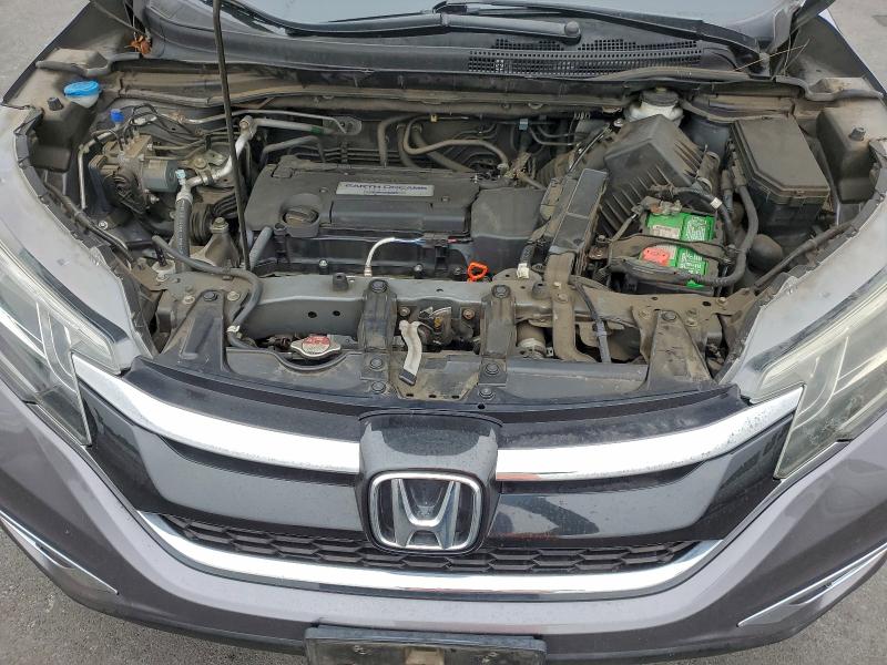 Photo 11 from auction – 2015 HONDA CR-V EX with VIN 2HKRM4H56FH661515