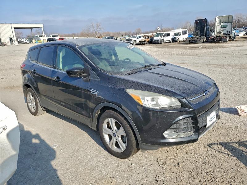 Photo 4 from auction – 2014 FORD ESCAPE with VIN 1FMCU0GX1EUC03723
