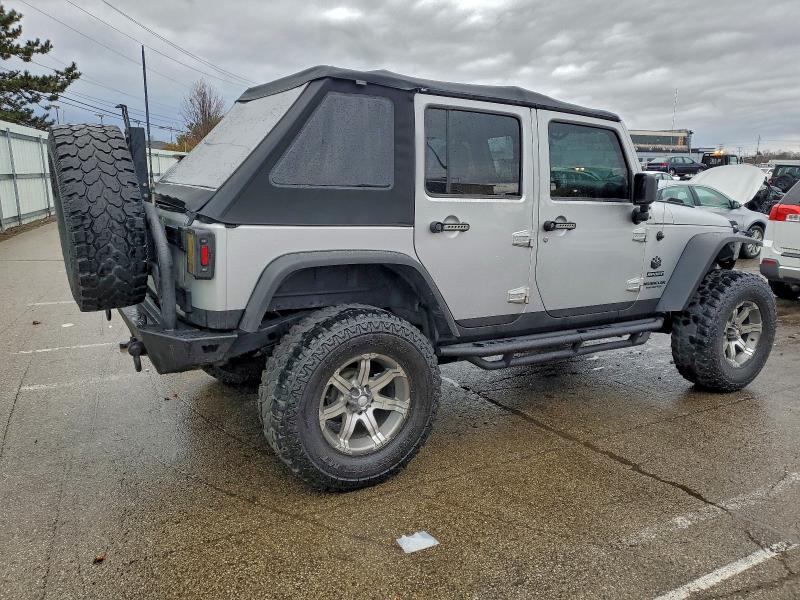 Photo 3 from auction – 2012 JEEP WRANGLER U with VIN 1C4BJWDG0CL142268
