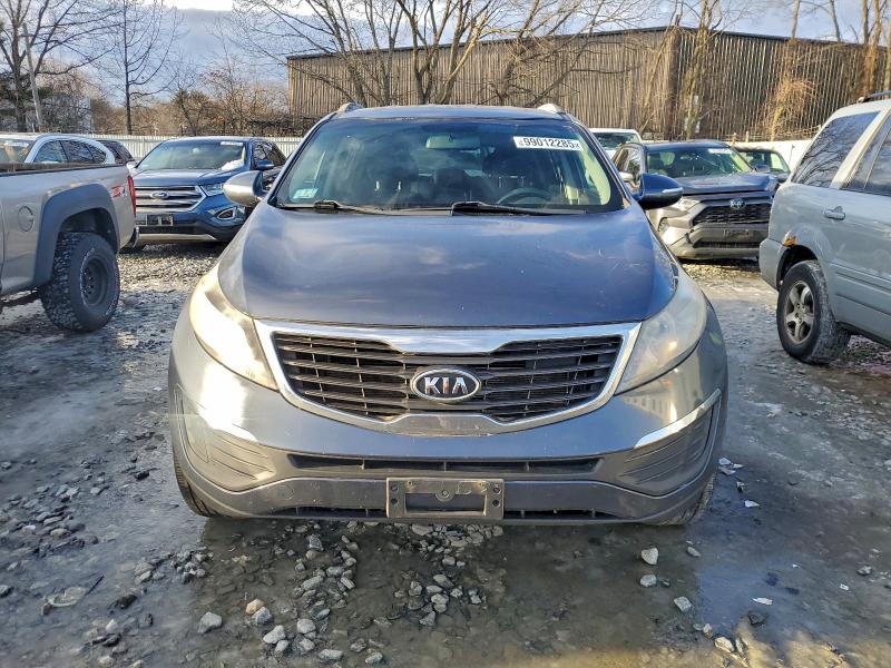 Photo 5 from auction – 2011 KIA SPORTAGE L with VIN KNDPBCA24B7163884