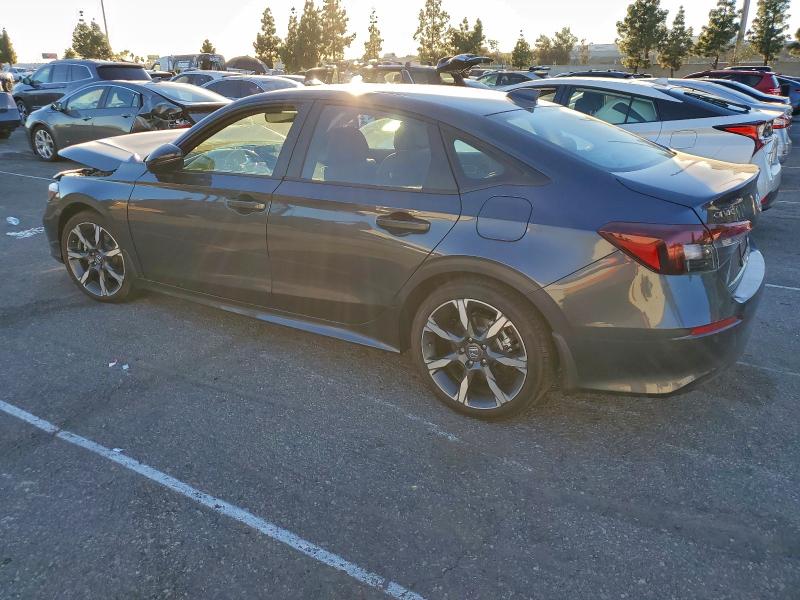 Photo 2 from auction – 2025 HONDA CIVIC with VIN 2HGFE4F86SH345856