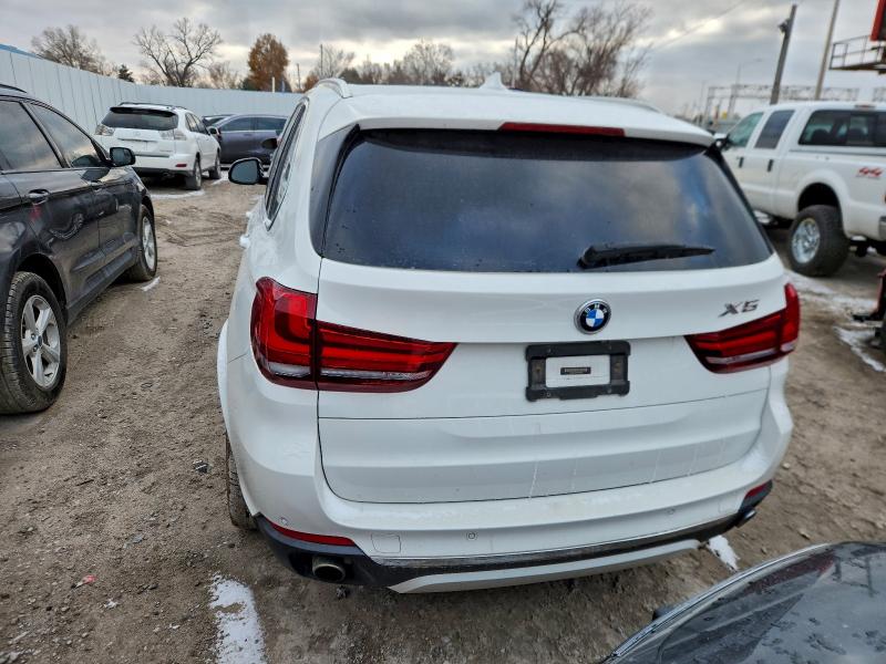 Photo 6 from auction – 2015 BMW X5 SDRIVE3 with VIN 5UXKR2C5XF0H39856