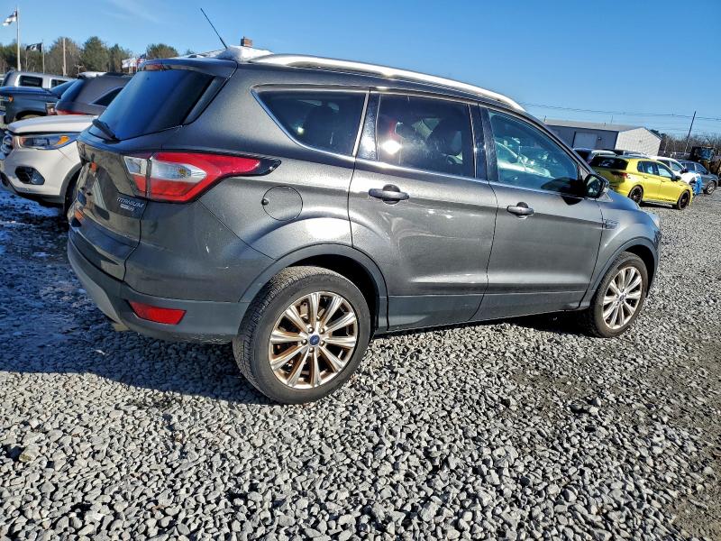 Photo 3 from auction – 2017 FORD ESCAPE TIT with VIN 1FMCU9JD4HUB94071