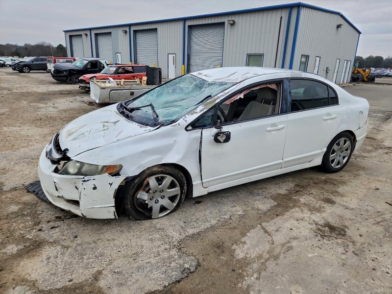 HONDA CIVIC LX 2009 with VIN 19XFA16589E015169 - Photo from auction