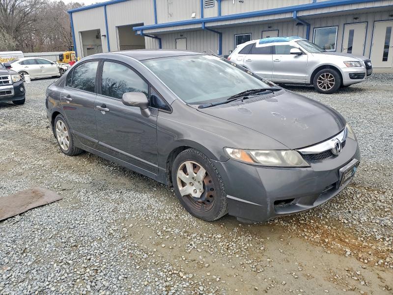 Photo 4 from auction – 2011 HONDA CIVIC LX with VIN 19XFA1F57BE028212