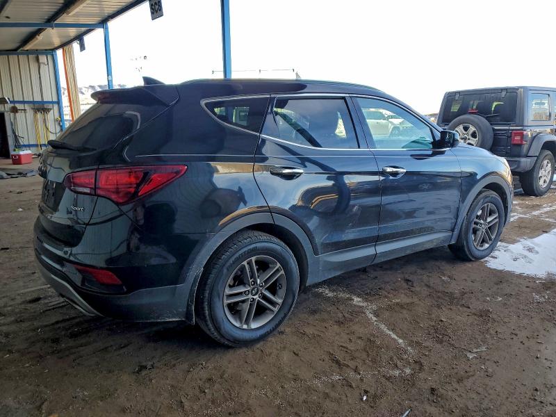 Photo 3 from auction – 2017 HYUNDAI SANTA FE S with VIN 5NMZU3LB9HH020849