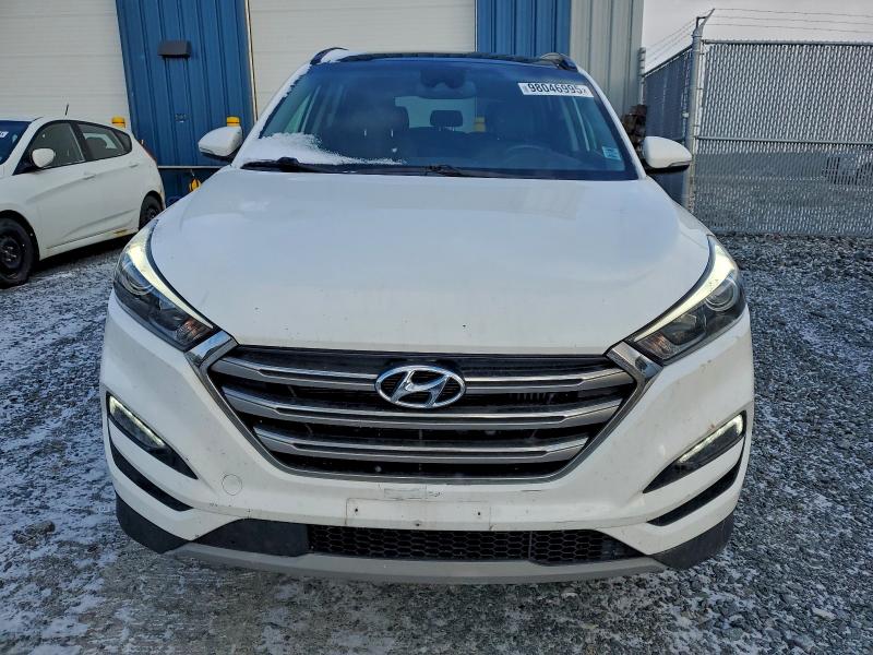 Photo 5 from auction – 2017 HYUNDAI TUCSON LIM with VIN KM8J3CA23HU435737
