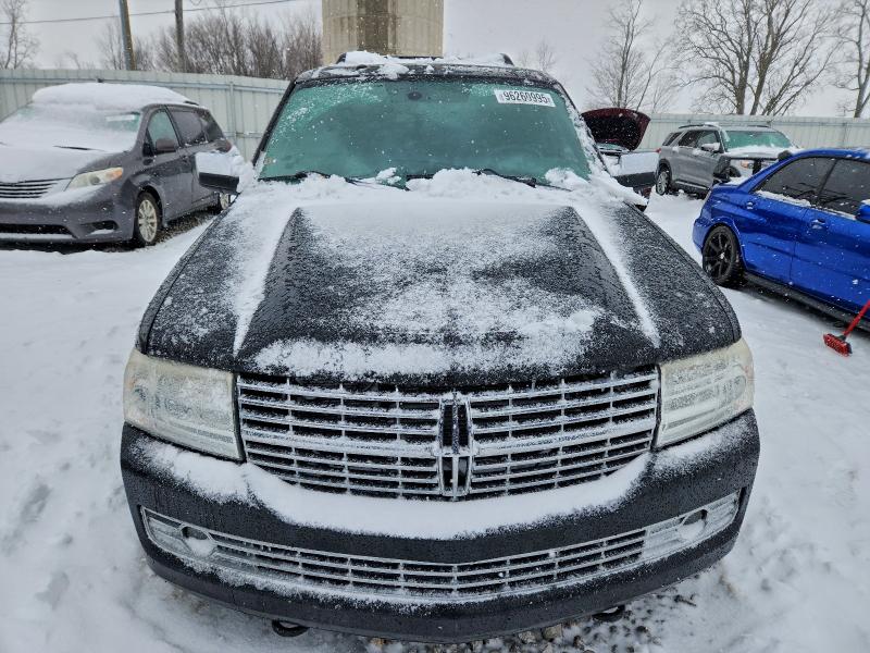 Photo 5 from auction – 2011 LINCOLN NAVIGATOR with VIN 5LMJJ2H56BEJ03998