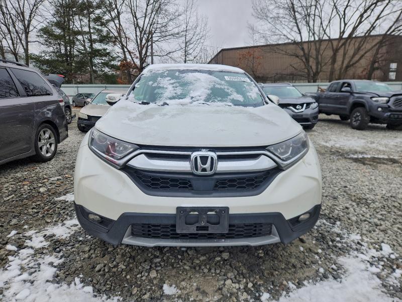 Photo 5 from auction – 2017 HONDA CR-V with VIN 5J6RW2H88HL073519