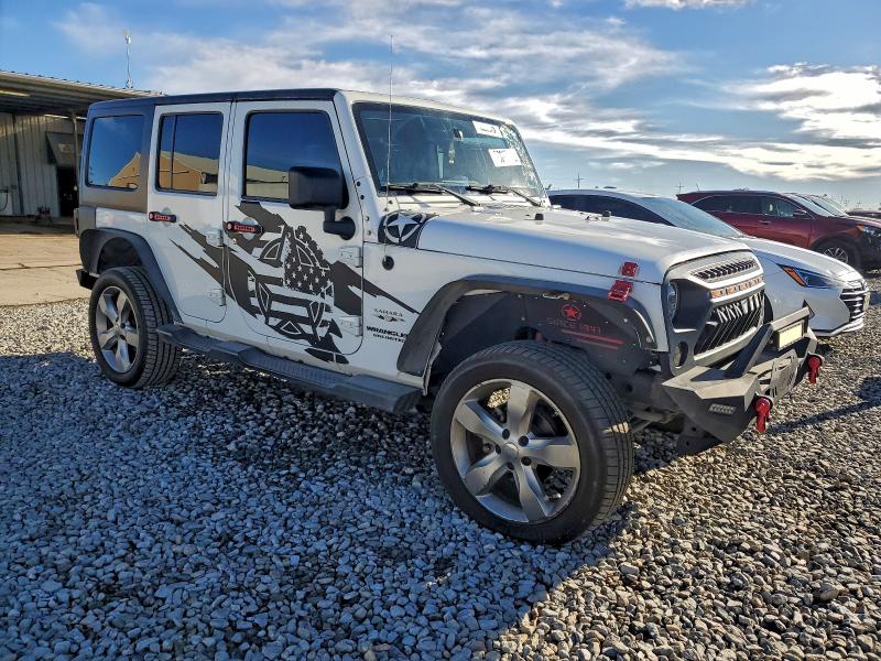 Photo 4 from auction – 2016 JEEP WRANGLER U with VIN 1C4BJWEG4GL145713