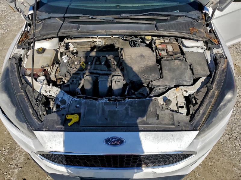 Photo 11 from auction – 2015 FORD FOCUS SE with VIN 1FADP3F29FL233668