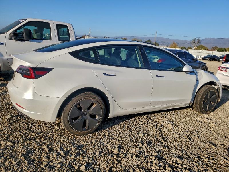 Photo 3 from auction – 2023 TESLA MODEL 3 with VIN 5YJ3E1EAXPF570850