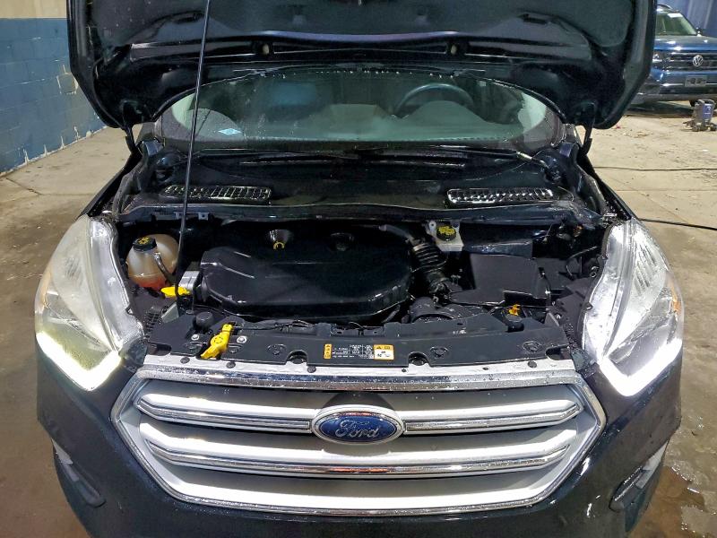 Photo 12 from auction – 2018 FORD ESCAPE TIT with VIN 1FMCU9J96JUA88576
