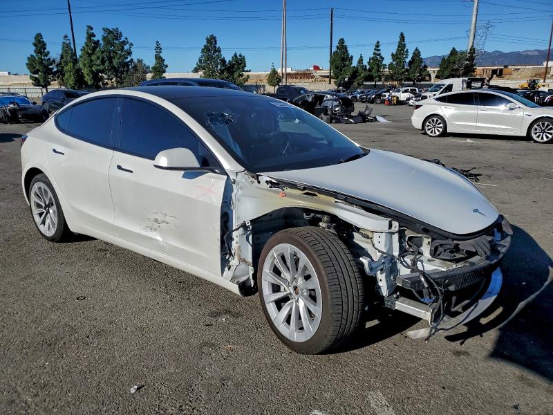 Photo 4 from auction – 2022 TESLA MODEL 3 with VIN 5YJ3E1EB7NF145379