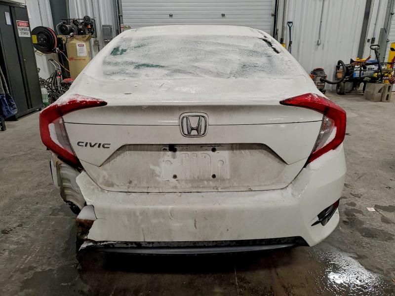 Photo 6 from auction – 2016 HONDA CIVIC LX with VIN 2HGFC2E52GH009727
