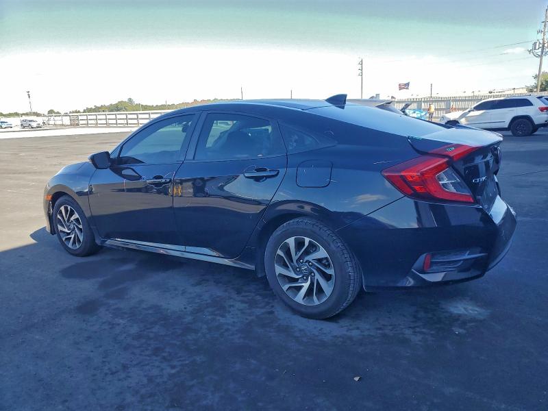 Photo 2 from auction – 2018 HONDA CIVIC EX with VIN 19XFC2F76JE030128