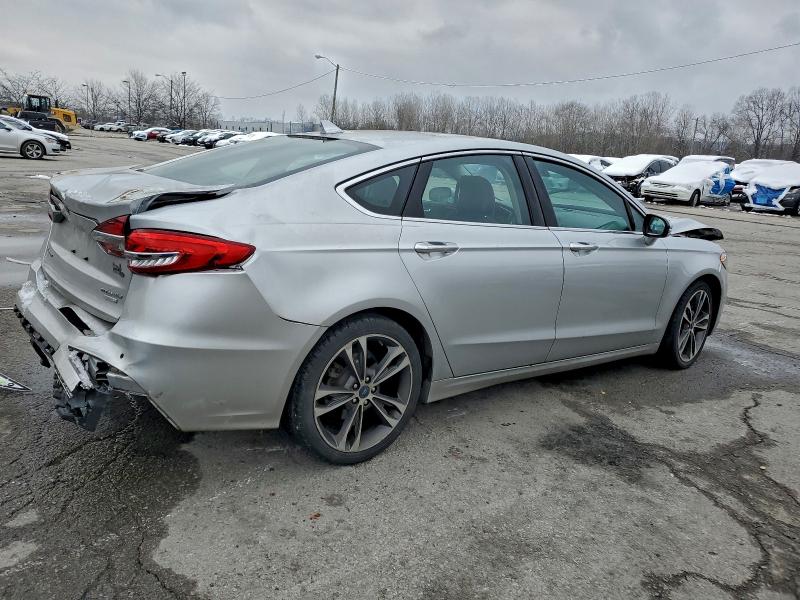 Photo 3 from auction – 2019 FORD FUSION TIT with VIN 3FA6P0K97KR144672