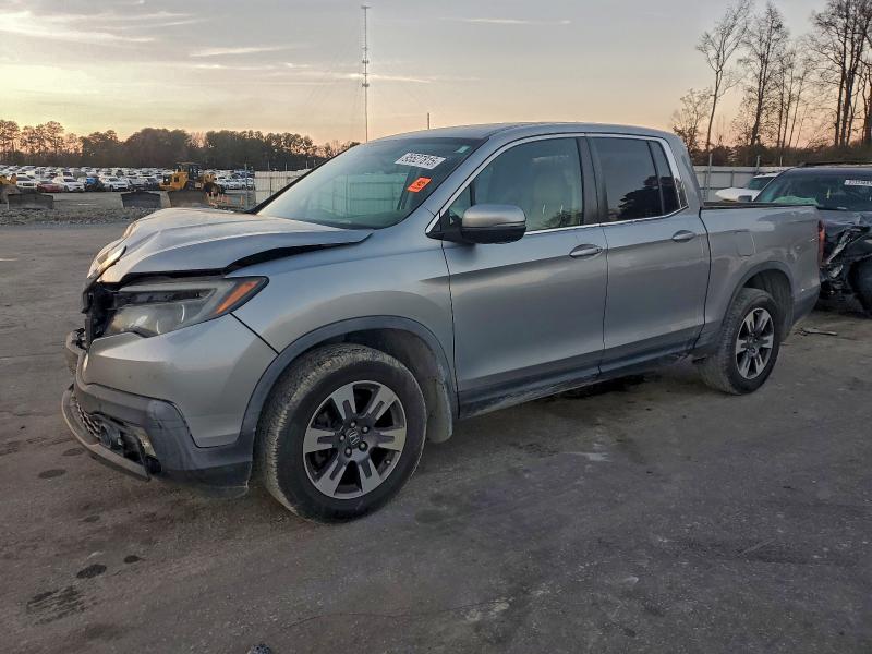 HONDA RIDGELINE 2017 with VIN 5FPYK3F54HB014697 - Photo from auction