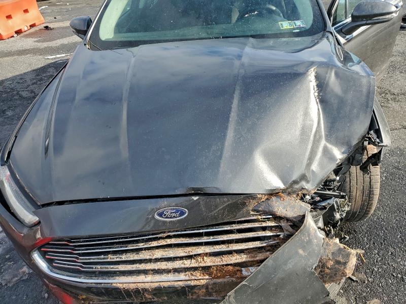Photo 11 from auction – 2015 FORD FUSION SE with VIN 3FA6P0LU0FR210813