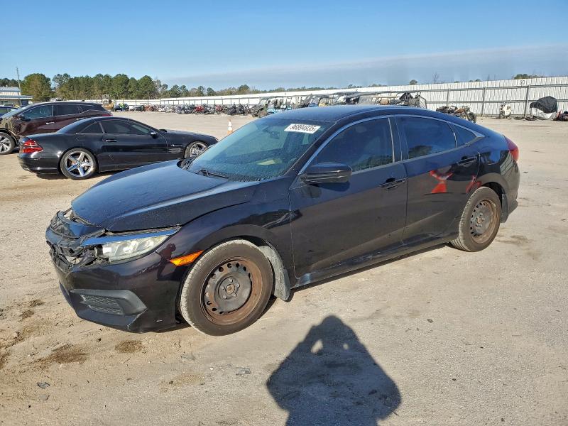 HONDA CIVIC LX 2016 with VIN 19XFC2F54GE009110 - Photo from auction