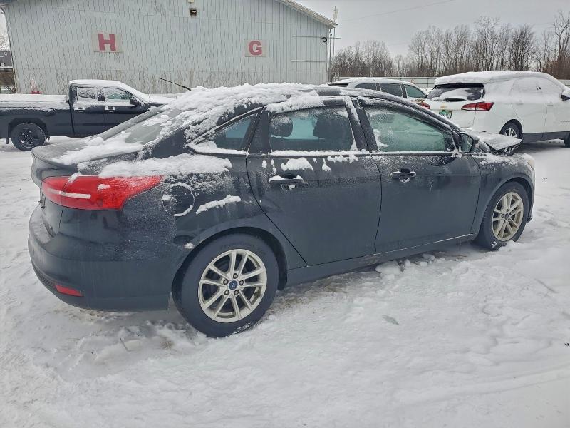 Photo 3 from auction – 2016 FORD FOCUS SE with VIN 1FADP3F26GL393072