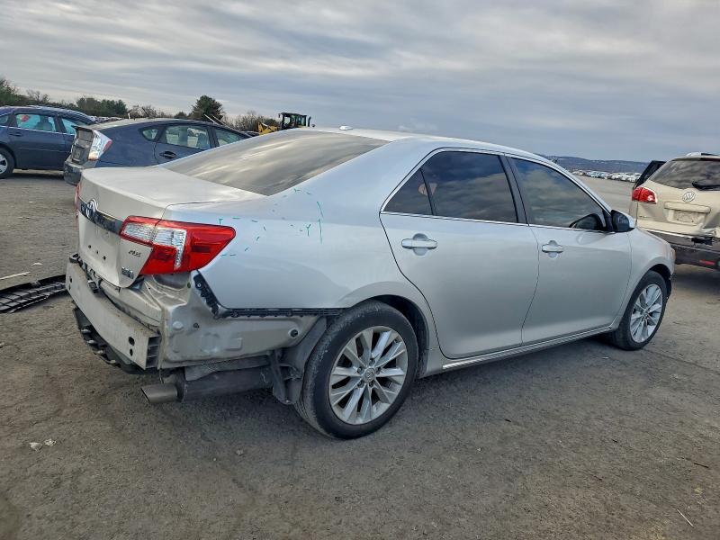 Photo 3 from auction – 2012 TOYOTA CAMRY HYBR with VIN 4T1BD1FK8CU018489