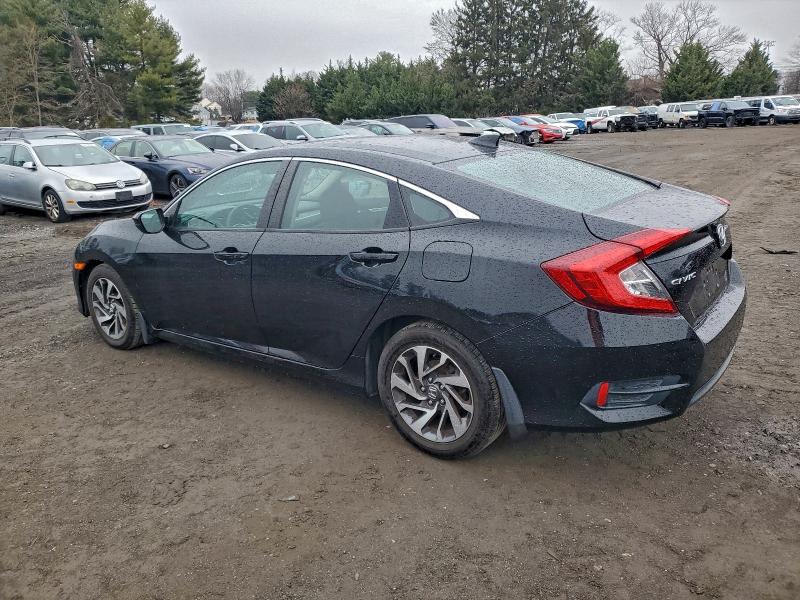 Photo 2 from auction – 2018 HONDA CIVIC EX with VIN 2HGFC2F77JH506490