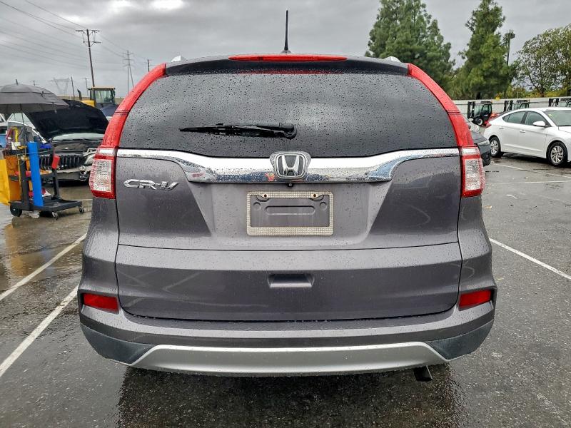 Photo 6 from auction – 2015 HONDA CR-V EXL with VIN 2HKRM3H75FH519930