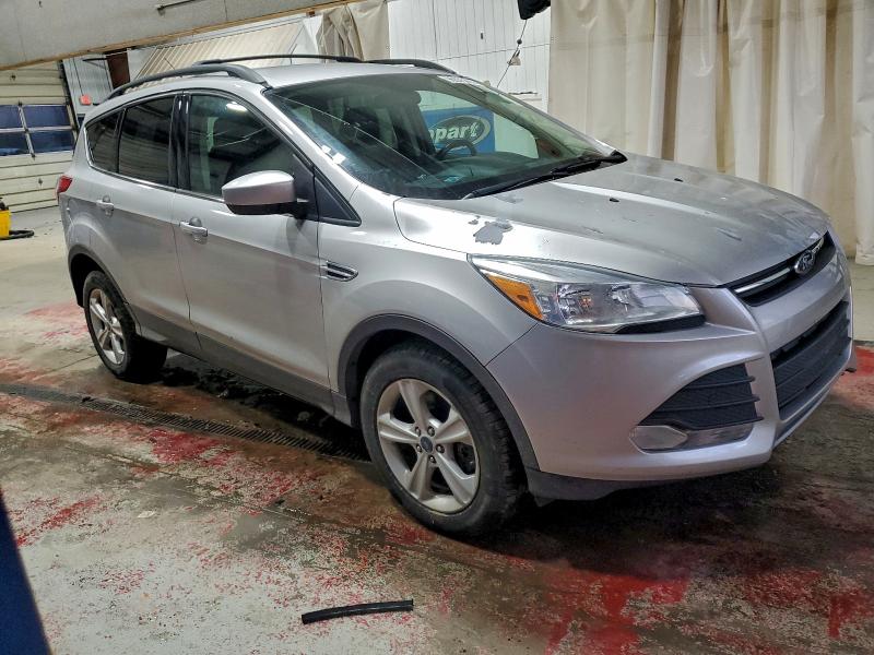 Photo 4 from auction – 2015 FORD ESCAPE SE with VIN 1FMCU9G96FUC22372