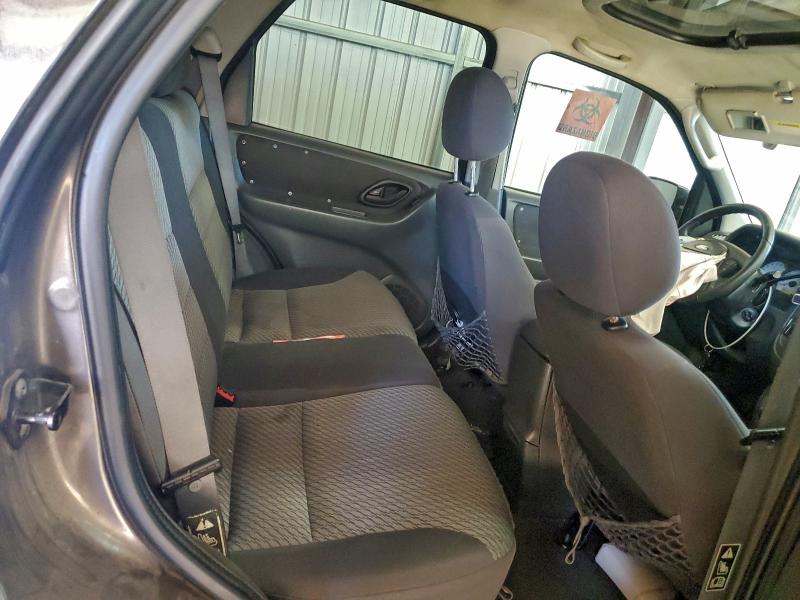 Photo 11 from auction – 2003 FORD ESCAPE XLT with VIN 1FMYU93103KD21203