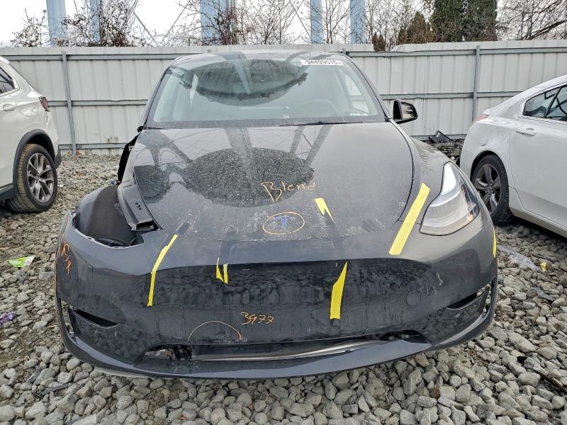 Photo 5 from auction – 2023 TESLA MODEL Y with VIN 7SAYGAEE8PF920384