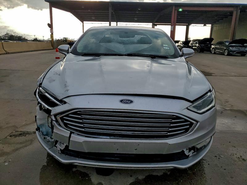 Photo 5 from auction – 2018 FORD FUSION TIT with VIN 3FA6P0D97JR219589